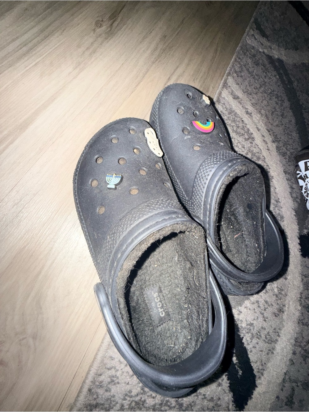 CROCS Kids Black Fuzzy-Lined Slip-Ons with Charms